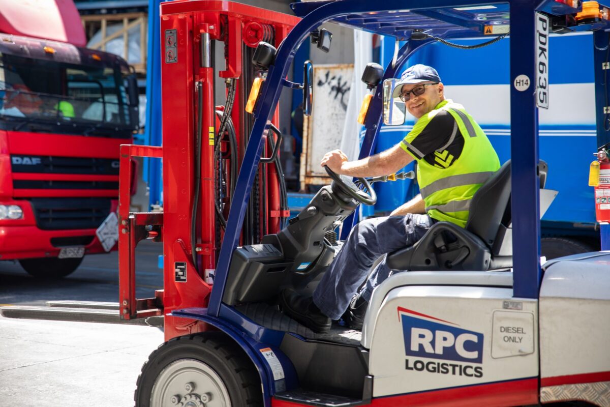 RPC Logistics forklift driver loading a delivery truck at the Auckland depot